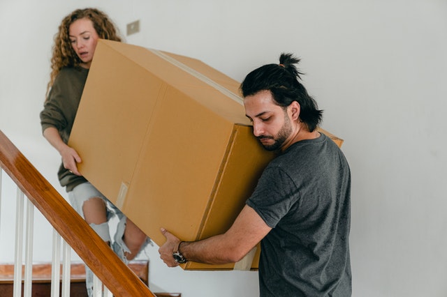 couple moving boxes